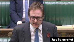 资料照片:英国保安国务大臣汤姆·图根达特(英国国会网页截图)