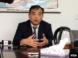 李进进,纽约执业律师 (美国之音方冰拍摄)