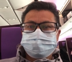 2021年1月28日下午,郭飞雄在广州飞往上海班机 (郭飞雄提供图片)