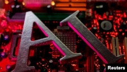 资料照片:代表“人工智能”一词英语缩写的字母“AI”以及计算机主板的图示。