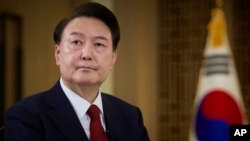 资料照:韩国总统府2024年2月7日发布的总统尹锡悦的照片。