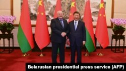 中国领导人习近平在北京会晤到访的白俄罗斯总统卢卡申科。(2023年12月4日)