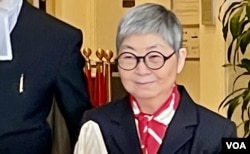 前法律界立法会议员吴霭仪就8-18流水式集会案终极上诉应讯后,离开终审法院 (美国之音/汤惠芸)