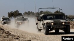 以色列军车队行驶在以色列与加沙的边界地带。(2023年12月31日)