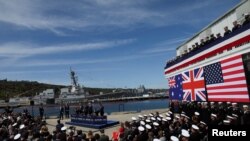 资料照:美国、英国和澳大利亚领导人在圣迭戈美国海军洛玛角基地宣布推进“澳英美安全协议”核潜艇方案。(2023年3月13日)