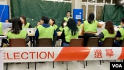 香港首次“爱国者治港”区议会选举，经过通宵点票后，结果显示地区投票率只有27.54%创历史新低 (美国之音/汤惠芸)
