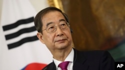 韩国总理韩德洙(Han Duck-soo)担任韩国代总统,代理尹锡悦总统料理国事。资料照