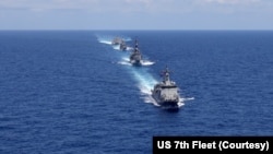 美国、日本、澳大利亚和菲律宾四国海军2024年4月7日在南中国海举行联合军演。(照片来自美国第七舰队X平台)