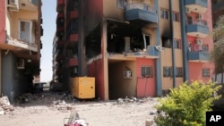 苏丹喀土穆的居民楼被战火炸毁。（2023年4月20日）