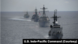 美国印太司令部2024年6月17日发布照片显示,美国、加拿大、日本和菲律宾在南中国海举行联合军演。