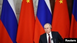 资料照:俄罗斯总统普京与中国领导人习近平在俄罗斯克里姆林宫举行会谈。(2023年3月21日)