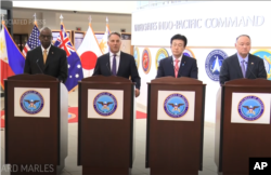 2024年5月2日,美国国防部长奥斯汀在夏威夷与澳大利亚副总理兼国防部长理查德·马尔斯、日本防卫大臣木原稔以及菲律宾国防部长吉尔伯托·特奥多罗举行四方会议。(照片来自美联社视频截图)