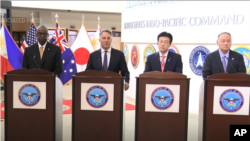 2024年5月2日,美国国防部长奥斯汀在夏威夷与澳大利亚副总理兼国防部长理查德·马尔斯、日本防卫大臣木原稔以及菲律宾国防部长吉尔伯托·特奥多罗举行四方会议。(照片来自美联社视频截图)