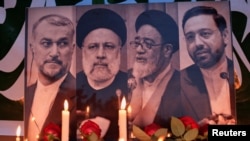 伊拉克民众在伊朗驻巴格达使馆外面对伊朗总统莱希等人的死亡表示哀悼。(2024年5月20日)