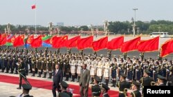 2023年5月15日,中国国家主席习近平和厄立特里亚总统伊萨亚斯·阿费沃基在北京人民大会堂外的欢迎仪式上。(路透社照片)