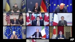 2022年10月11日,七大工业国组织领导人同乌克兰总统泽连斯基举行视频会议,乌克兰总统泽连斯基(左上角)与日本首相岸田文雄(右下角)同框出现在视频会议银幕上。