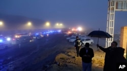 伊朗在被怀疑为总统莱希的直升机坠毁地点附近的救援车辆。(2024年5月19日)