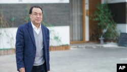 资料照:中国病毒学家张永振在上海。(2020年12月13日)