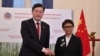 Menlu China Qin Gang berjabat tangan dengan Menlu Retno Marsudi saat sesi foto di Jakarta, 22 Februari 2023. (Foto: Adek Berry via REUTERS)