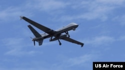 资料照:美国空军MQ-9“收割者”侦察机在一次演习中飞行。