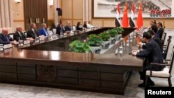 资料照:中国领导人习近平与叙利亚总统阿萨德在杭州举行会谈。(2023年9月22日)