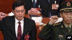 中国前外长秦刚和前国防部长李尚福（资料照）