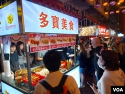 佐敦区的茶餐厅在晚饭时间的生意也难言理想 (美国之音 林淦峰)