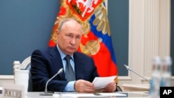 俄罗斯总统普京在莫斯科通过视频出席G20峰会。(2023年11月22日)