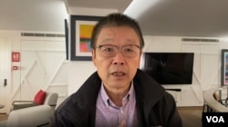 在英国从事移民法律工作的黄华(美国之音/李伯安)