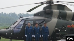 中国军方“加油” 呼吁国人“给力”