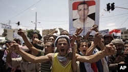 9月24日,也门首都萨那的抗议者举行示威,要求总统萨利赫辞职