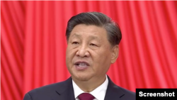 习近平总书记在中共二十大开幕式上作政治报告。