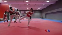 အိုလံပစ်ဝင်ပြိုင်မယ့် အာဖဂန် ဒုက္ခသည် အမျိုးသမီး တိုက်ကွမ်ဒို အားကစားသမား  အိုလံပစ်ဝင်ပြိုင်မယ့် အာဖဂန် ဒုက္ခသည် အမျိုးသမီး တိုက်ကွမ်ဒို အားကစားသမား