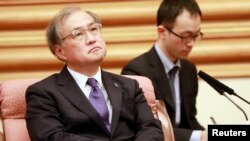 时任日本副外相的秋叶刚男2018年8月访问北京。(媒体联访照片)