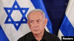 资料图片:2023年10月28日以色列总理内塔尼亚胡在特拉维夫举行新闻发布会。(路透社)