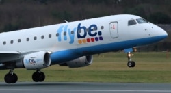 资料照:英国航空公司弗莱比(Flybe)在曼彻斯特机场起飞。(2020年1月13日)