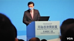 香港特首选举唯一候选人李家超4月29日在湾仔会议展览中心举行政纲简介会,约300名港九新界的地区及基层代表出席 (美国之音/汤惠芸)