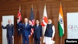 参与印太地区安全四方机制会谈的四国领导人2022年5月24日在东京聚首。(路透社转发媒体联访照片)