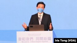 香港特首选举唯一候选人李家超在造势大会上发言,透露小时候被人欺负的经历,令他立志长大后做警察。 (美国之音 汤惠芸)