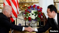 资料照片:美国总统拜登2022年5月23日在东京与日本首相岸田文雄会面。(路透社照片)