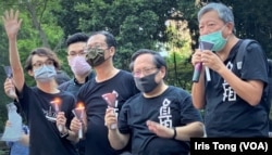 已经解散的香港支联会前正副主席李卓人(右一)、何俊仁(右二),被控国安法“煽动颠覆国家政权罪” (美国之音/汤惠芸)