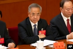 资料照:中国副总理胡春华在中共二十大开幕式上。(2022年10月16日)