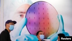 中国上海2021年3月举办一次半导体技术展。(路透社)