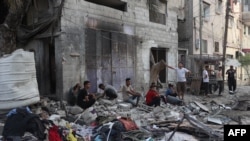 资料照片:加沙南部拉法城的苏尔坦社区遭到以色列空袭。(2024年5月20日)