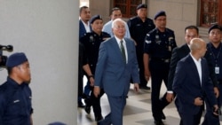 မလေးဝန်ကြီးချုပ်ဟောင်း Najib Razak နိုင်ငံပိုင် 1MDB လုပ်ငန်းက ဒေါ်လာဘီလျံနဲ့ချီ အလွဲသုံးမှုနဲ့ ရင်ဆိုင်နေရ မလေးဝန်ကြီးချုပ်ဟောင်း Najib Razak နိုင်ငံပိုင် 1MDB လုပ်ငန်းက ဒေါ်လာဘီလျံနဲ့ချီ အလွဲသုံးမှုနဲ့ ရင်ဆိုင်နေရ