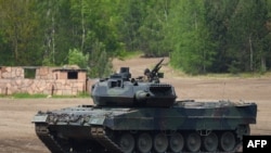 资料照:德国制造的豹式 2 A7 主战坦克。