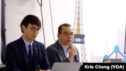 传协董事之一、前香港有线电视财经台台长颜宝刚（右）（美国之音郑乐捷）