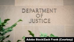 资料照片:美国司法部字样。