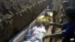 Pristalica svrgnutog egipatskog predsjednika Mohameda Morsija sa njegovom fotografijom u Sani, Yemen.