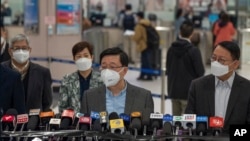 中港重开边境的第一天,香港特首李家超在落马洲边境检查站讲话。(2023年1月8日)